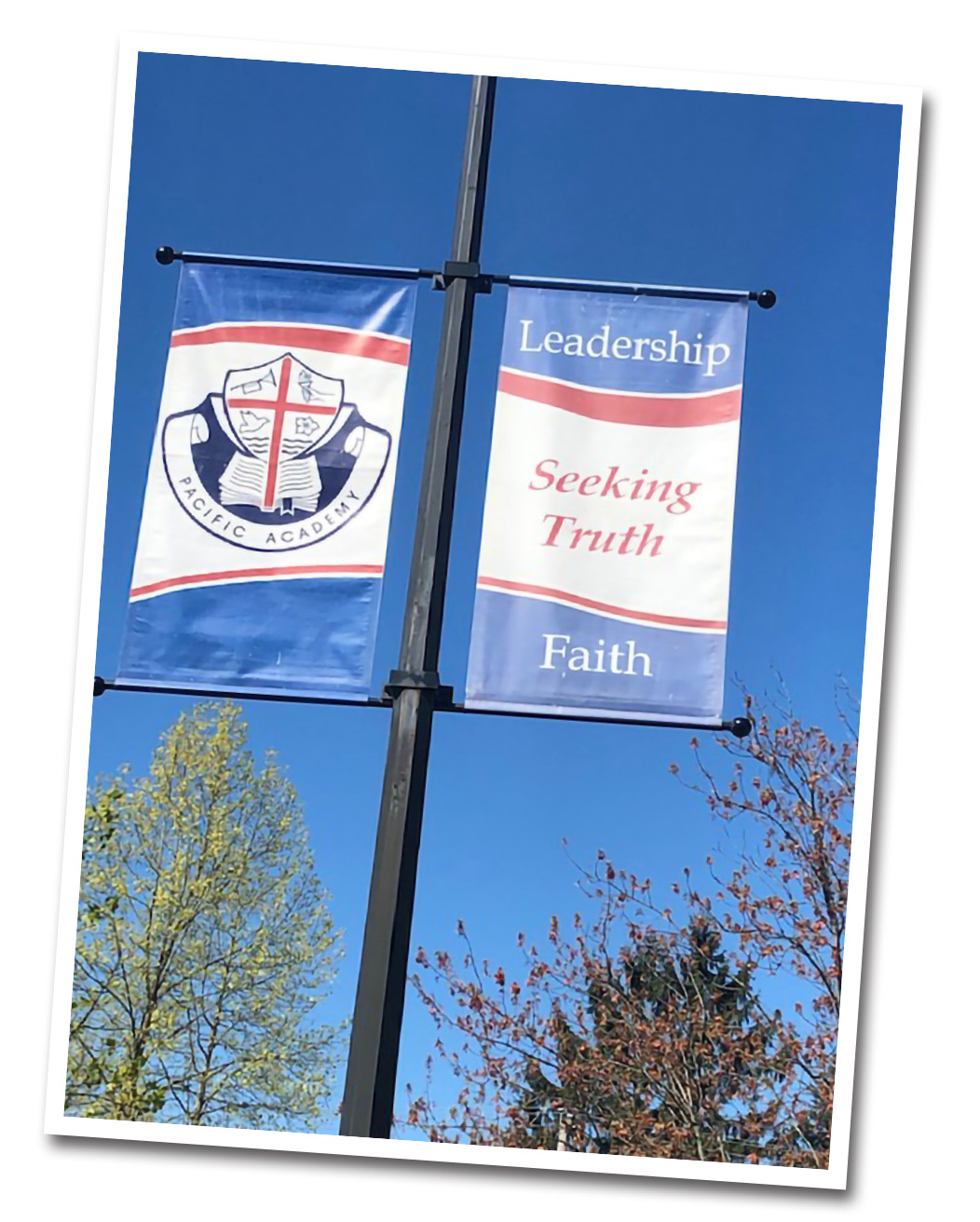 Double Banner with school logo on left and text "Leadership, Seeking Truth, Faith" on right.
