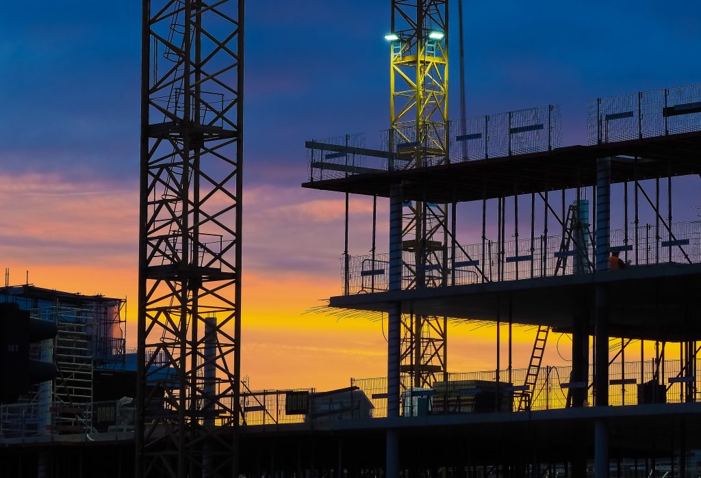 Scaffolding at a construction site at dusk